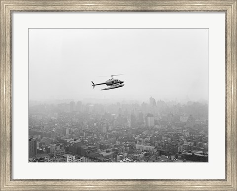 Framed USA, New York State, New York City, Helicopter over city Print