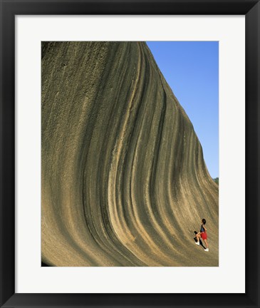 Framed Person climbing Wave Rock, Western Australia, Australia Print