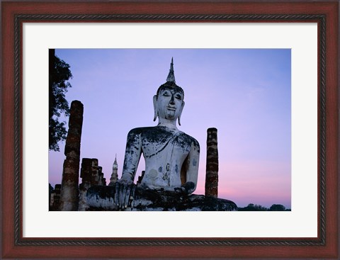 Framed Low angle view of the Seated Buddha, Wat Mahathat, Sukhothai, Thailand Print