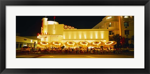 Framed Restaurant lit up at night, Miami, Florida, USA Print