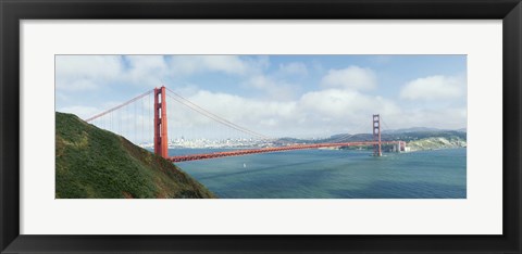 Framed Suspension bridge with a city in the background, Golden Gate Bridge, San Francisco Bay, San Francisco, California, USA Print