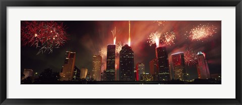 Framed Fireworks over buildings in a city, Houston, Texas Print