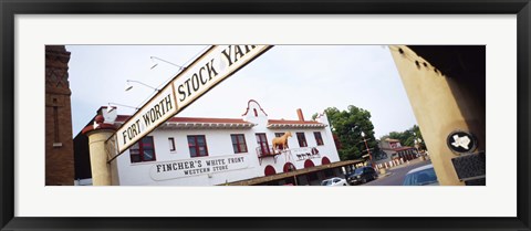 Framed Low angle view of a commercial signboard, Fort Worth Stockyards, Fort Worth, Texas, USA Print