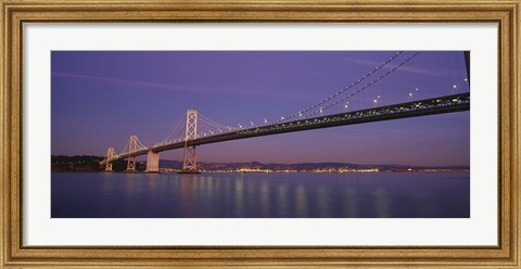 Framed Low angle view of a bridge at dusk, Oakland Bay Bridge, San Francisco, California, USA Print