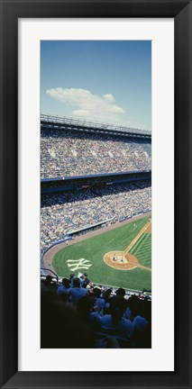 Framed High angle view of spectators watching a baseball match in a stadium, Yankee Stadium, New York City, New York State, USA Print