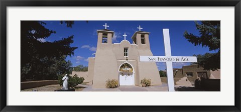Framed Cross in front of a church, San Francisco de Asis Church, Ranchos De Taos, New Mexico, USA Print
