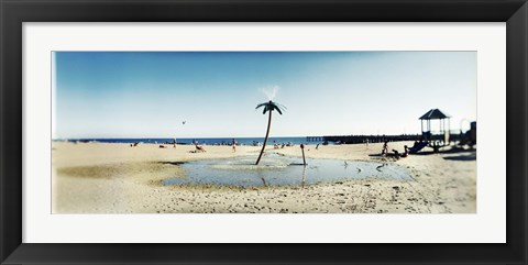 Framed Palm tree sprinkler on the beach, Coney Island, Brooklyn, New York City, New York State, USA Print