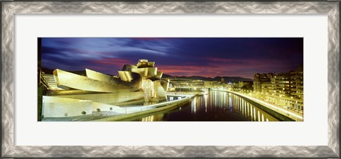 Framed Buildings lit up at dusk, Guggenheim Museum Bilbao, Bilbao, Vizcaya, Spain Print