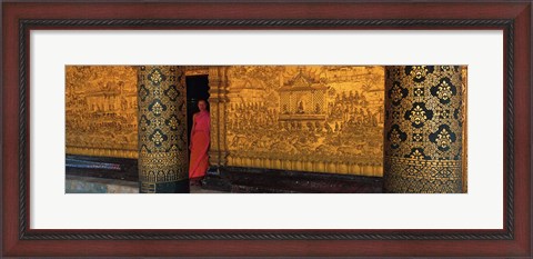 Framed Monk in prayer hall at Wat Mai Buddhist Monastery, Luang Prabang, Laos Print