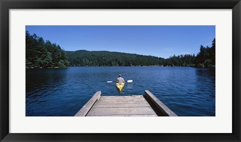 Framed Rear view of a man on a kayak in a river, Orcas Island, Washington State, USA Print