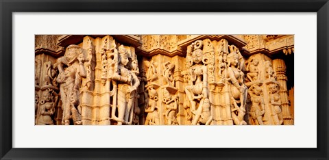 Framed Sculptures carved on a wall of a temple, Jain Temple, Ranakpur, Rajasthan, India Print