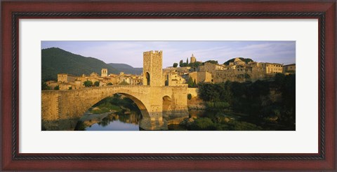 Framed Arch bridge across a river in front of a city, Besalu, Catalonia, Spain Print