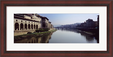 Framed Buildings along a river, Uffizi Museum, Ponte Vecchio, Arno River, Florence, Tuscany, Italy Print