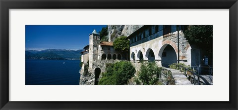Framed Walkway along a building at a lake, Santa Caterina del Sasso, Lake Maggiore, Piedmont, Italy Print