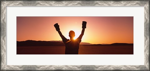 Framed Silhouette of a person wearing boxing gloves in a desert at dusk, Black Rock Desert, Nevada, USA Print