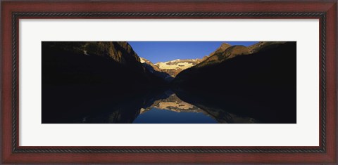 Framed Reflection of mountains in a lake, Lake Louise, Banff National Park, Alberta, Canada Print