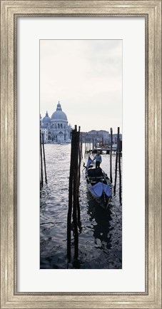 Framed Gondolier in a gondola with a cathedral in the background, Santa Maria Della Salute, Venice, Veneto, Italy Print