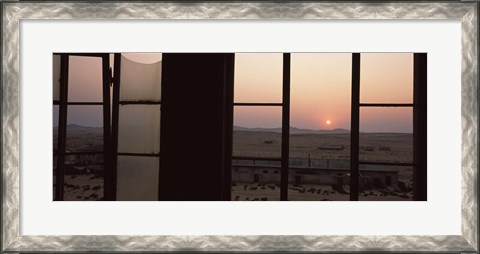 Framed Sunrise viewed through a window, Sperrgebiet, Kolmanskop, Namib Desert, Namibia Print