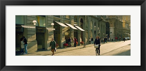 Framed Cyclists and pedestrians on a street, City Center, Florence, Tuscany, Italy Print