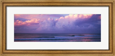 Framed Clouds over the sea at sunset Print