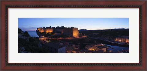 Framed Castle lit up at night, Bonifacio Harbour, Corsica, France Print