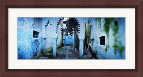 Framed Painted wall of medina, Chefchaouen, Morocco Print