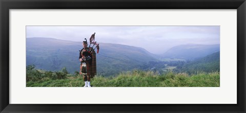 Framed Bagpiper at Loch Broom in Scottish highlands, Ross and Cromarty, Scotland Print