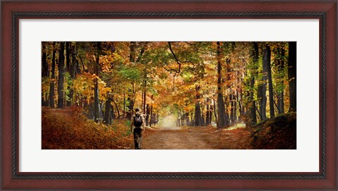 Framed Kid with backpack walking in fall colors Print