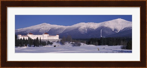 Framed Hotel near snow covered mountains, Mt. Washington Hotel Resort, Mount Washington, Bretton Woods, New Hampshire, USA Print