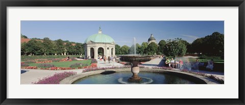 Framed Germany, Munich, Hofgarten, Tourist sitting in the park Print