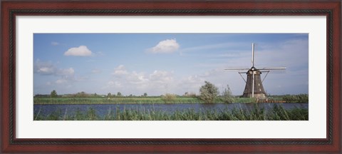 Framed Netherlands, Traditional windmill in the village Print