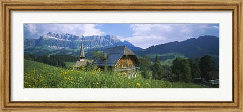 Framed Chalet and a church on a landscape, Emmental, Switzerland Print