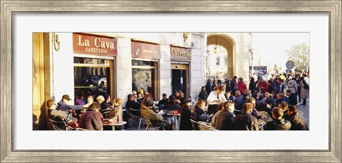 Framed Tourists sitting outside of a cafe, Barcelona, Spain Print