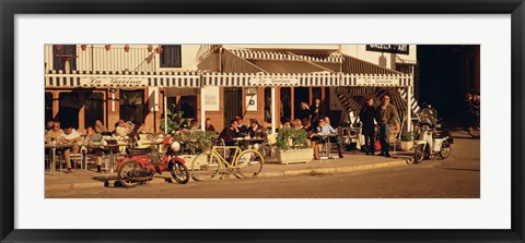 Framed Tourists sitting in a cafe, Sitges Beach, Catalonia, Spain Print