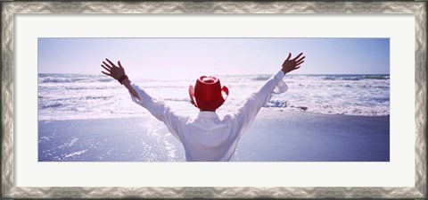 Framed Woman With Outstretched Arms On Beach, California, USA Print