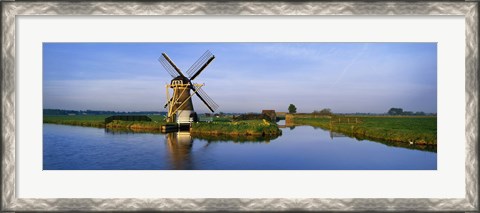 Framed Traditional Windmill On The Waterfront, Netherlands Print