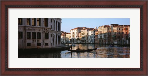 Framed Man on a gondola in a canal, Grand Canal, Venice, Italy Print
