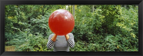 Framed Woman blowing a balloon, Germany Print