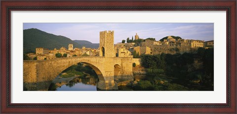 Framed Arch bridge across a river in front of a city, Besalu, Catalonia, Spain Print