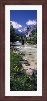 Framed Bridge over stream below country church, Bavarian Alps, Germany. Print