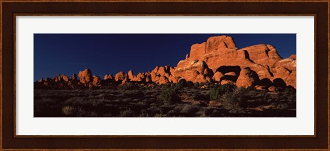 Framed Rock formations on an arid landscape, Arches National Park, Moab, Grand County, Utah, USA Print