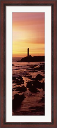 Framed Silhouette of a lighthouse at sunset, Pigeon Point Lighthouse, San Mateo County, California Print