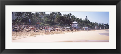Framed Tourists on the beach, North Shore, Oahu, Hawaii, USA Print