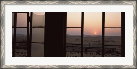 Framed Sunrise viewed through a window, Sperrgebiet, Kolmanskop, Namib Desert, Namibia Print
