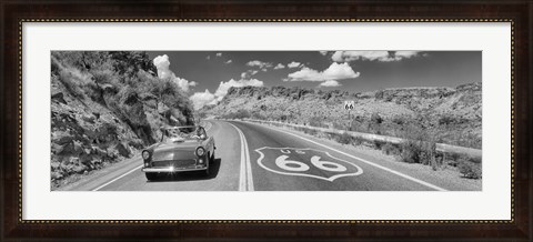 Framed Vintage car moving on Route 66 in black and white, Arizona Print