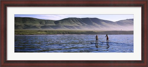 Framed Tourists paddleboarding in the pacific ocean, Santa Cruz Island, Santa Barbara County, California Print
