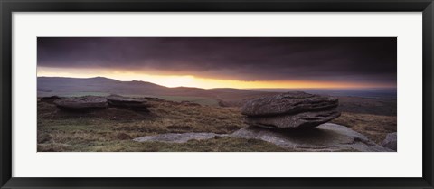 Framed Bright horizon with dark clouds from Higher Tor, Dartmoor, Devon, England Print