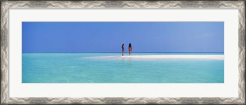 Framed Two women standing on the beach sandbar, Maayafushi Island, Ari Atoll, Maldives Print