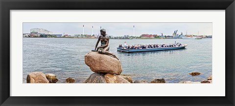 Framed Little Mermaid Statue with tourboat in a canal, Copenhagen, Denmark Print