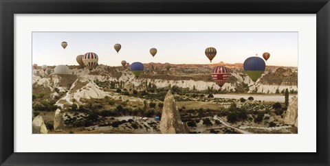 Framed Mulit colored hot air balloons at sunrise over Cappadocia, Central Anatolia Region, Turkey Print